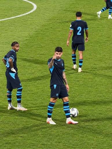 Ruben Neves pointing towards the sky and then gesturing towards the section of the stand from which the chants appeared to originate.